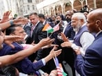 PM Modi in US: Narendra Modi greets supporters of the Indian community on the way to the Lotte New York Palace Hotel, his stay in New York.(AP)