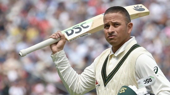 Australia's Usman Khawaja acknowledges the crowd as he walks off the pitch after being given out clean bowled by England's Ollie Robinson during day three of the first Ashes Test cricket match between England and Australia at Edgbaston, Birmingham, England, Sunday, June 18, 2023. Khawaja made 141 runs. (AP/PTI) (AP06_18_2023_000091A)(AP)