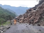 Mandi-Kullu road via the Kataula-Kamand stretch was blocked due to landslides. Incessant rain in several districts of Himachal Pradesh over the week has caused trouble for the locals as well as tourists. Landslides in many places have also been reported as a result of torrential rainfall after a cloudburst.(HT Photo)