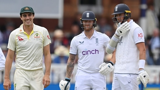 Stuart Broad and Pat Cummins had a brief exchange after Jonny Bairstow's dismissal.(Getty)