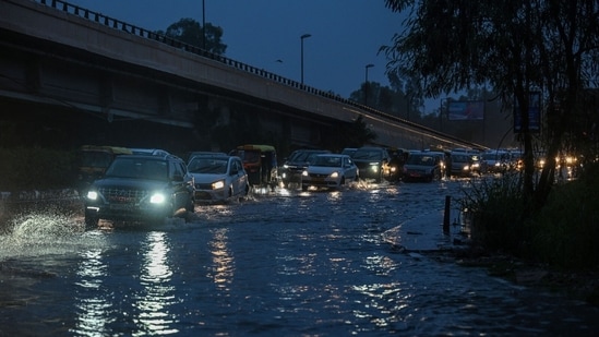Heavy rains lashed parts of Delhi-NCR region including Noida on Saturday amid waterlogging due to the swelling level of river Yamuna.(Raj K Raj/ Hindustan Times)