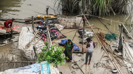 Local Residents seen cleaning their house after the flooded water recedes at Yamuna Khadar area Mayur Vihar in New Delhi.(Raj K Raj/ Hindustan Times)