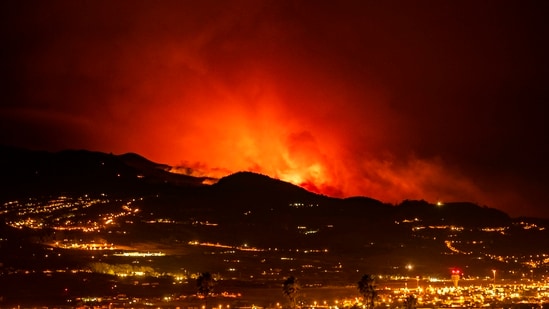 More people were evacuated from their homes on Saturday morning on the Spanish island of Tenerife as a wildfire raging in the north of the island remained out of control. A blaze broke out earlier this week in a mountainous national park around the Mount Teide volcano, Spain's highest peak, amid hot and dry weather. The flames have so far avoided major tourist areas. (AP)