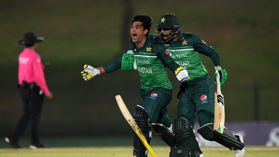 Pakistan's Naseem Shah and Haris Rauf (R) celebrate after Pakistan won by 1 wicket during the second one-day international (ODI) cricket match against Afghanistan(AFP)