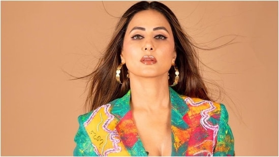 Hina Khan often delights her millions of followers on Instagram by sharing a glimpse of her photoshoots, travel diaries, and more. Recently, Hina posted pictures from a latest fashion shoot dressed in a multi-coloured embroidered mini blazer dress. She styled the ensemble with striking accessories and glam picks. Scroll through to check out her pictures. (Instagram)