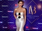 Malaika Arora was among the stars of the night in a white silk gown with a centre slit. She paired it with little jewellery and hours later, went to the airport to see off her son Arhaan Khan. 