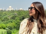 Malaika Arora shared stunning pictures of herself as she posed with The Taj Mahal in the background during her Agra trip. While sharing a picture with a cup of tea, Malaika wrote, “Wah Taj” on her Instagram Stories. 