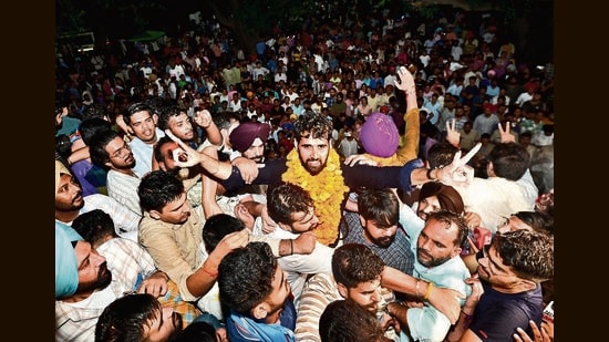 NSUI’s Jatinder Singh with his supporters at the Student Centre after winning the post of president in Panjab University Campus Student Council elections on Wednesday. (RAVI KUMAR/HT)