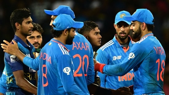 Sri Lanka's Dunith Wellalage (3R) shakes hands with India's Virat Kohli (R) at the end of the Asia Cup 2023 match(AFP)