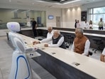 Prime Minister Narendra Modi, who is on a visit to Gujarat, enjoyed a cup of tea served by robots at the Robotics Gallery in the state.(Twitter/@narendramodi)