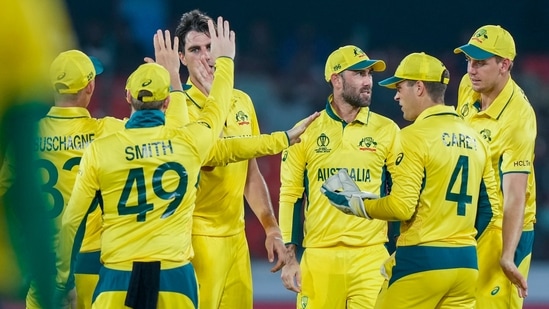 Australia's Pat Cummins, without cap, celebrates the wicket of Pakistan's Imam-ul-Haq during the ICC Cricket World Cup warmup match between Pakistan and Australia in Hyderabad, India, Tuesday, Oct. 3, 2023(AP)