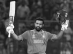 Rohit Sharma raises his bat after scoring a century(Rohit Chawla)