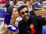 Alia Bhatt kisses husband Ranbir Kapoor as she poses with her first National Film Award at the ceremony. Ranbir was playing the supportive husband for Alia at the event and even clicked her pictures as she received the award. (PTI)