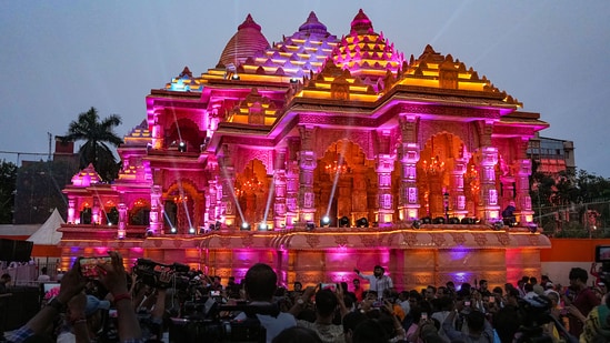 Organized by the Santosh Mitra Square Puja Committee, this unique pandal is modelled after the Ram Temple in Ayodhya.(PTI)