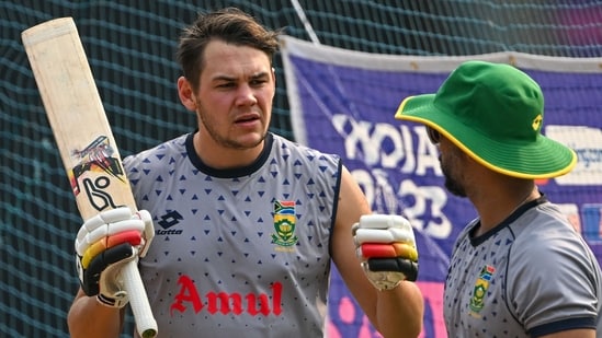 South Africa's Gerald Coetzee (L) speaks during a practice session(AFP)