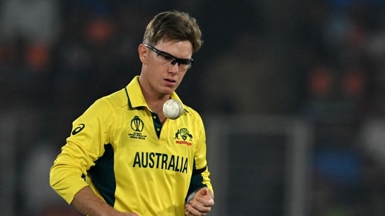 Australia's Adam Zampa tosses the ball(AFP)