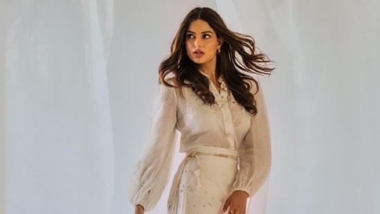 Harnaaz Sandhu took to Instagram recently to share several pictures of herself dressed in a steal-worthy all-white ensemble. The former Miss Universe dropped the photos with the captions, "Living a poem," and "Mindset separates the best from the rest." The posts show Harnaaz looking radiant in the ensemble, which she had worn to attend Isha Ambani's kids' star-studded birthday bash in Mumbai. Scroll through to see what Harnaaz wore.&nbsp;(Instagram)