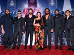 Actors Ranbir Kapoor, Rashmika Mandanna and Bobby Deol, director Sandeep Reddy Vanga, managing director of T-Series Bhushan Kumar and others at the trailer launch of their upcoming film Animal in New Delhi on Thursday. The men were all dressed in black semi-formal looks.(PTI)