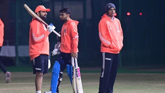 Indian captain Rohit Sharma along with Rahul Dravid during the practice session at PCA Stadium in Mohali 