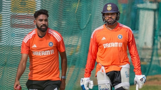 India's captain Rohit Sharma with teammate Mohammed Siraj during a practice session ahead of the first Test vs England(PTI)