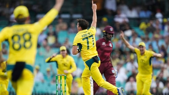 Australia's Sean Abbott, center, celebrates taking the wicket of West Indies' Kjorn Ottley, second right.(AP)