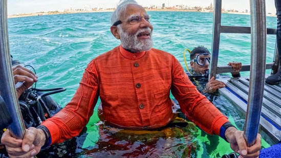 PM Modi after offering prayers underwater at the spot where the submerged city of Dwarka is, in Dwarka, Gujarat.(PTI)