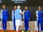 PM Modi reviewed the progress of Gaganyaan mission and bestowed 'astronaut wings' to the astronaut-designates at Vikram Sarabhai Space Centre. (PTI)