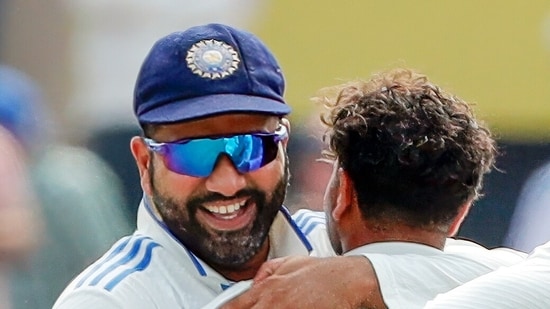 India's Kuldeep Yadav and skipper Rohit Sharma celebrate the wicket of England's Zak Crawley (BCCI-X)