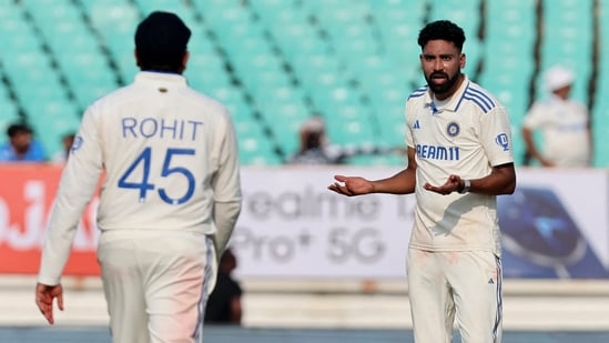 India's Mohammed Siraj speaks to Rohit Sharma(REUTERS)