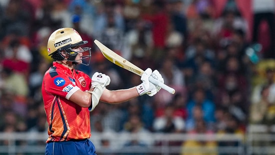 Punjab Kings' Sam Curran reacts after completing a half-century(PTI)