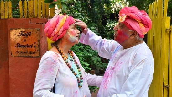 Shabana Azmi and Javed Akhtar share a cute moment at he puts colour on her face on Holi. They hosted their annual Holi party on Monday.