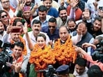 Kangana Ranaut with the Leader of Opposition in Himachal Pradesh Jai Ram Thakur receive a warm welcome at Bhimakali Temple Complex for a party meeting, in Mandi on Monday.(X)