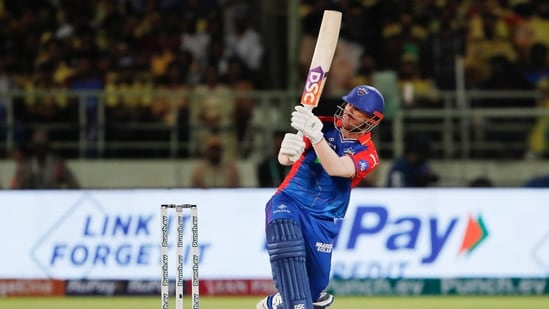 Delhi Capitals' David Warner, who is at the fourth spot in the Orange Cap rankings, plays a shot during the match against Chennai Super Kings. (ANI)