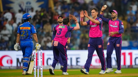 Rajasthan Royals bowler Trent Boult celebrates the wicket of Mumbai Indians batter Naman Dhir (PTI)