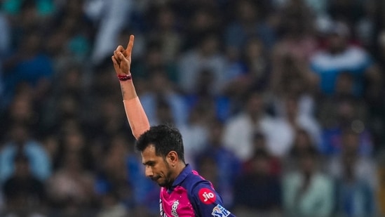 Rajasthan Royals bowler Yuzvendra Chahal celebrates the wicket of Mumbai Indians batter Tilak Varma during the Indian Premier League (IPL) 2024 cricket match (PTI)