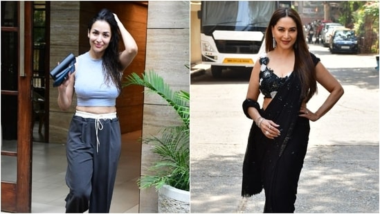 The paparazzo clicked Malaika Arora and Madhuri Dixit today. While Malaika was snapped outside her residence in Mumbai, Madhuri was pictured on the sets of Dance Deewane along with Bharti Singh and Suniel Shetty. While Malaika kept things casual for her off-duty look, Madhuri looked dazzling in a sequinned black saree. Scroll through to see their paparazzi pictures inside. (HT Photo/Varinder Chawla)