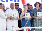 Congress President Mallikarjun Kharge, CPP Chairperson Sonia Gandhi, party General Secretary Priyanka Gandhi Vadra and others during the launch of the 'Congress Manifesto' during a public rally ahead of the Lok Sabha elections, in Jaipur on Saturday. Former Rajasthan CM Ashok Gehlot and party leader Sachin Pilot were also present.(ANI)