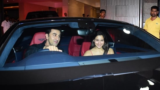 Ranbir Kapoor was spotted driving his swanky new Bentley Continental with wife Alia Bhatt. His new car is reportedly worth <span class='webrupee'>₹</span>8 crore. They were seen exiting their building Vastu for a late-night outing. (Pic: Varinder Chawla)
