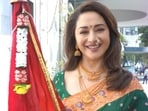 Madhuri Dixit shared a special video on the festival. She wore a bright green saree.