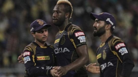 Kuldeep Yadav (L), Andre Russell (C) and Dinesh Karthik (R)(AP)