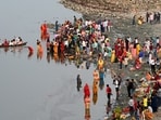 On Sunday, April 14, India celebrated the auspicious festival of Chaiti Chhath. This ancient Hindu festival is observed during the Chaitra month and is considered a significant four-day event. During this festival, women worship the Sun god, and the celebration culminates on Saptami with the offering of Arghya to the rising sun. This year, the festival of Chaiti Chhath began on April 12 and will continue until April 15, 2024. Let's explore how the third day of the Chaiti Chhath puja festival is observed in various parts of India.  (Photo by Sunil Ghosh / Hindustan Times)