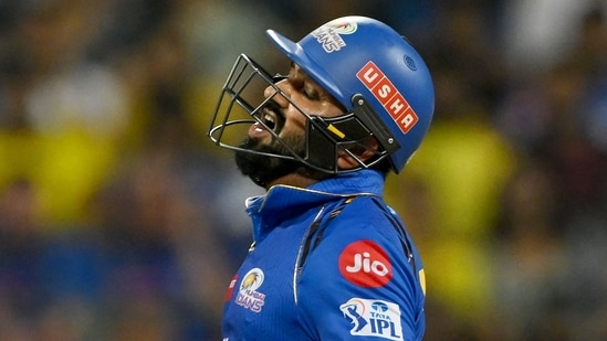 Rohit Sharma was devoid of emotion on completing his 2nd IPL century. (AFP)