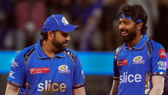 Mumbai Indians captain Hardik Pandya and Rohit Sharma during the IPL match against Royal Challengers Bengaluru (PTI)