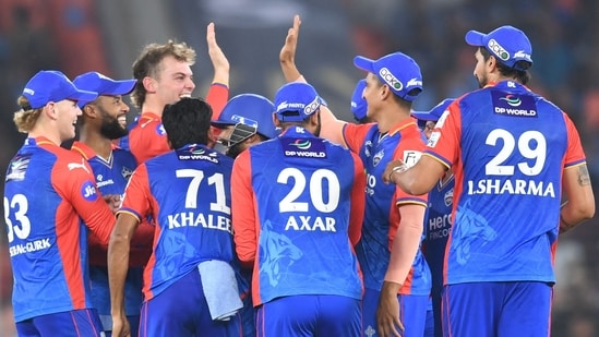 Delhi Capitals' players celebrate after the dismissal of Gujarat Titans' M Shahrukh Khan during the Indian Premier League (IPL) Twenty20 cricket match between Delhi Capitals and Gujarat Titans(AFP)