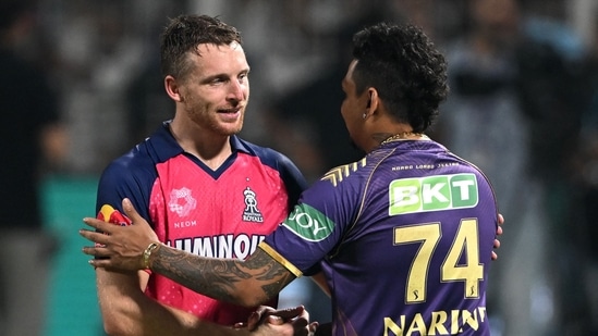 Rajasthan Royals' Jos Buttler (L) and Kolkata Knight Riders' Sunil Narine greet each other(AFP)