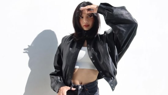 Leather jackets and boots are the last thing on our minds during the summer. But Lisa, a member of the K-pop girl group Blackpink, is here to prove otherwise. The singer and rapper took to Instagram to share poolside pictures of herself dressed in an all-black stylish summer outfit featuring a black leather jacket and denim cut-out shorts. She added some colour with a white crop top. Scroll through to see Lisa's photos and steal some sartorial inspiration for your next uber-cool summer look.&nbsp;(Instagram)