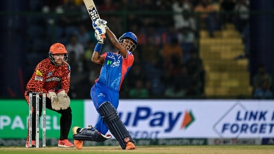 Delhi Capitals' Abishek Porel (R) plays a shot(AFP)