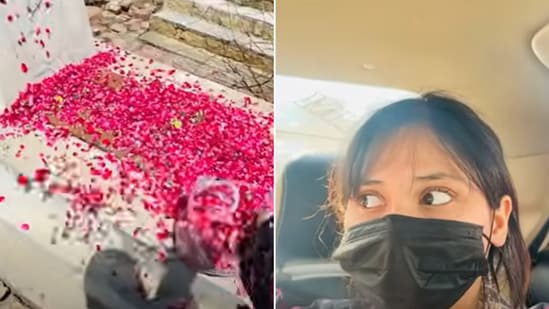 The image, taken from a viral video, shows a Pakistani YouTuber vlogging her visit to her sister's grave. (YouTube/@Noorranaofficial)