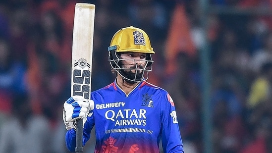 Royal Challengers Bengaluru's Rajat Patidar celebrates after scoring a half-century (50 runs) during the Indian Premier League (IPL) Twenty20 cricket match between Sunrisers Hyderabad and Royal Challengers Bengaluru(AFP)