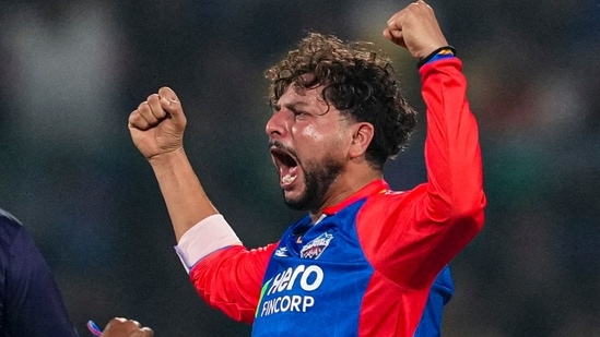 Delhi Capitals bowler Kuldeep Yadav celebrates the wicket of Rajasthan Royals batter Ravichandran Ashwin during the Indian Premier League (IPL) 2024 cricket match between Delhi Capitals and Rajasthan Royals(PTI)